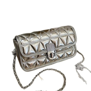 Chic silver quilted shoulder bag with diamond pattern and metallic chain strap
