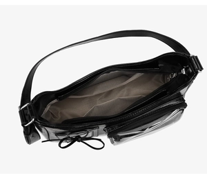 Internal view of black PU leather crossbody bag showing grey herringbone lining and pockets