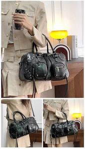 Close-up of black glossy boston bag featuring vintage rivets, long tassels and silver buckles