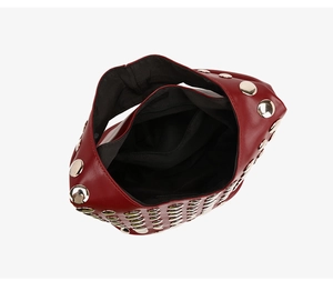 Top view of burgundy studded tote bag showing the black fabric lining and inner zip pocket