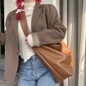 Chic light brown soft leather oversized tote bag for women shown as a casual shoulder bag
