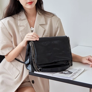 Chic black glossy leather chain crossbody bag for women stylish large tote model view