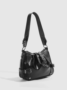 Side view of black glossy PU leather shoulder bag with buckle details and ruffles