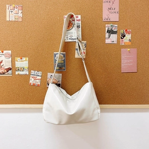Minimalist large white tote bag with adjustable shoulder strap for women's daily commute
