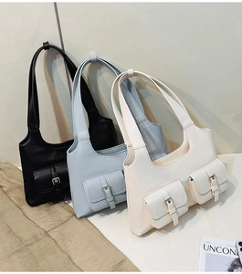 Detailed comparison of vintage faux leather tote bags in black, blue, and cream finishes