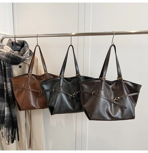 Maillard style leather tote bags in brown and black displayed for autumn fashion outfit