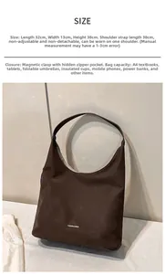Dettaglio della borsa tote marrone vintage con dimensioni 32x13x38cm e grande capienza