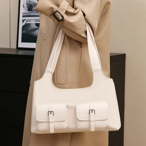 Retro cream white hobo bag with double front buckle pockets and wide shoulder strap