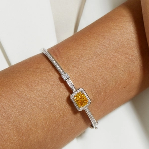 S925 silver bracelet featuring a rectangular yellow gemstone and micro-pave crystals