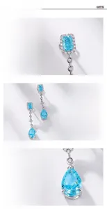 Macro details of S925 silver earrings featuring light blue pear-cut drop carbon diamonds