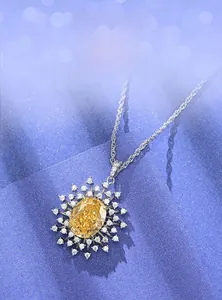 Close-up of S925 silver sunflower pendant featuring a yellow carbon diamond and fine chain