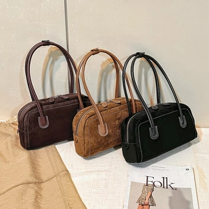 Minimalist vintage shoulder bags in brown, tan and black suede with contrast stitching