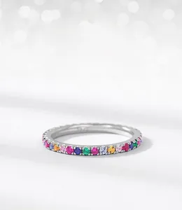 Macro detail of S925 sterling silver ring showing colorful rainbow zircon inlay