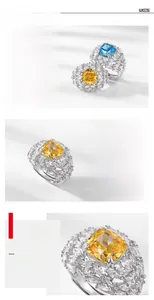 Détails macro de bagues en argent S925 avec diamants jaunes et bleus taille glace
