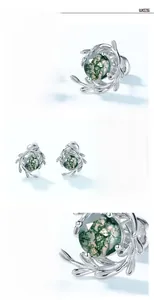 Macro detail of S925 silver green moss agate earrings featuring natural vine textures