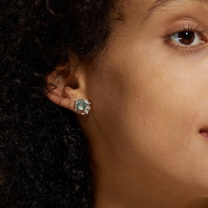 Close-up of S925 silver moss agate stud earrings featuring a vintage vine design on model