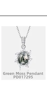Macro view of oval moss agate pendant with sparkling cubic zirconia cluster setting