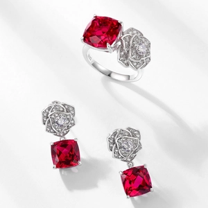 S925 sterling silver jewelry set featuring red cushion cut gems and rose floral accents