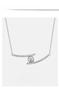 Macro view of S925 sterling silver necklace with circular moissanite and pave diamonds