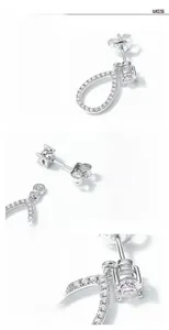 Macro detail of S925 sterling silver moissanite earrings with pear-shaped drops