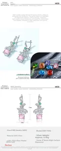Vue macro de boucles d'oreilles nœud en argent S925 avec diamant rose de 8x8mm à haute teneur