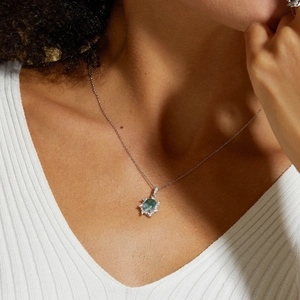 S925 silver moss agate sunflower pendant necklace worn by model on white background