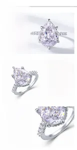 Macro view of pear-cut high carbon diamond with S925 silver pave setting and fine polish
