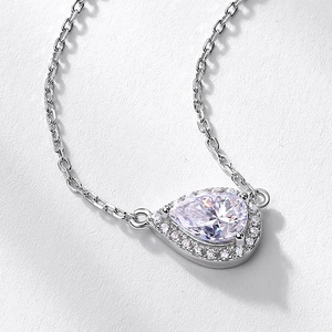 Elegant S925 silver pear-cut moissanite halo pendant necklace on a modern cable chain