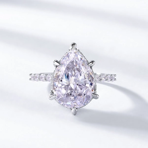 Elegant S925 silver pear cut high carbon diamond ring with pave set stones on the band