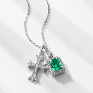 S925 silver necklace with emerald cut green gemstone and pavé cross pendant