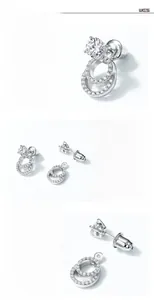 Detailed view of S925 silver moissanite earrings with double ring design and secure backings