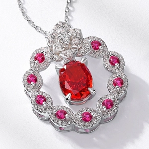 Exquisite S925 silver necklace featuring an oval red gemstone pendant with floral diamond halo
