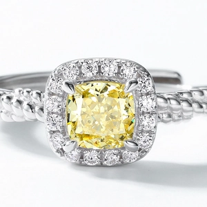 Halo S925 silver ring with cushion cut yellow diamond and twisted band design