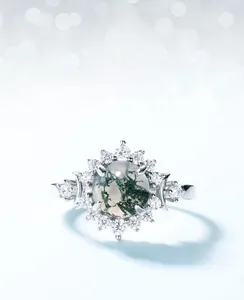 Close-up of moss agate sunflower ring with S925 silver and sparkling zircon details