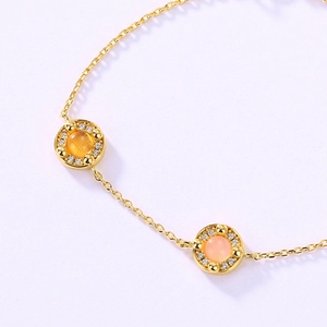 Elegante bracciale in argento S925 con ciondoli geometrici arancioni e rosa e zirconi bianchi