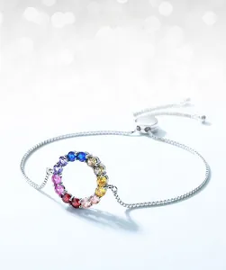 Macro view of S925 sterling silver bracelet with a colorful round zirconia circle pendant