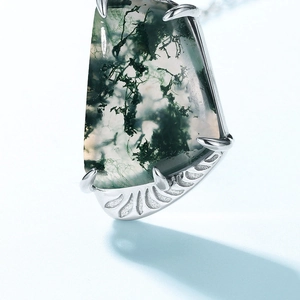 Minimalist silver necklace with geometric green moss agate pendant in 4-prong setting