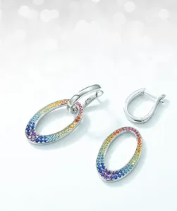 Macro shot of S925 sterling silver stamp and colorful zircon inlay details on hoop earring