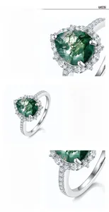 Detailed view of pear-cut green moss agate ring in S925 silver with diamond accents