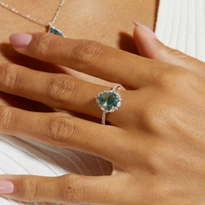 Pear cut moss agate ring with halo diamonds on S925 silver, styled for elegant women
