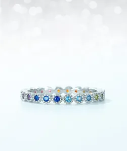 Detailed macro view of S925 silver ring featuring round cut rainbow zircon gemstones