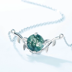 Silver leaf moss agate necklace featuring a natural green stone and vintage design