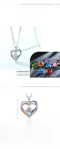 Détail macro du collier coeur en argent S925 avec zircons et informations de taille