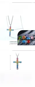 Detailed view of S925 silver rainbow cross pendant with dimensions 23.5mm by 14mm