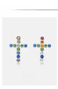 Close-up of S925 silver stud earrings with colorful rainbow cubic zirconia cross design