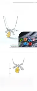 Detail of S925 silver bow pendant necklace with 14mm yellow pear-cut carbon diamond
