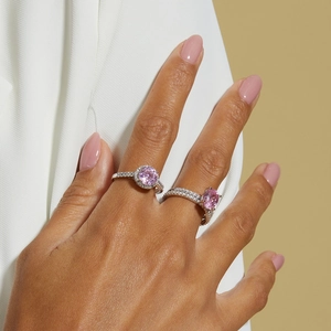 Elegant S925 silver rings with halo pink zircon stones worn on model finger