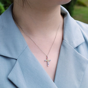 Rainbow cross pendant necklace with colorful cubic zirconia on a silver chain