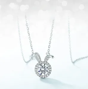 Close-up of S925 silver bunny necklace with sparkling moissanite in prong setting