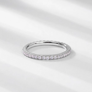Elegant S925 sterling silver eternity ring featuring a full circle of pink cubic zirconia